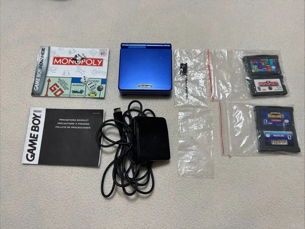 Nintendo Game Boy Advance SP Blue AGS-001 + Charger + Case + 4 Games WORKS GREAT